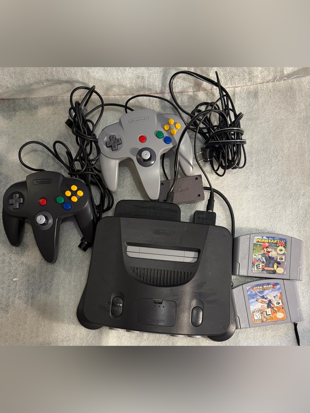 Nintendo N64 Console with Black Console & Gray and Black Controllers